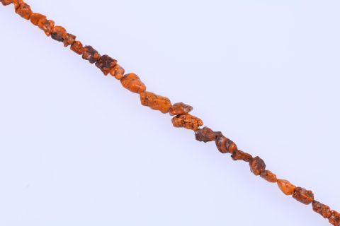 Strang Howlite, orange, Brocken, 9x17mm, 40cm