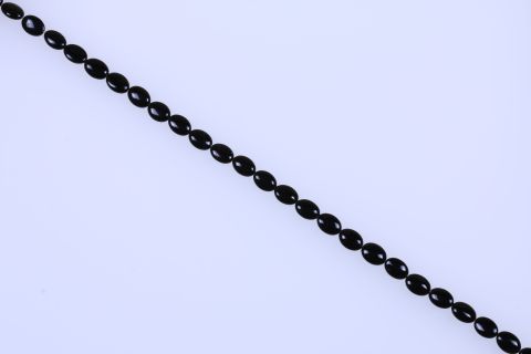 Strang Onyx, schwarz, oval, 10x14mm, 39cm