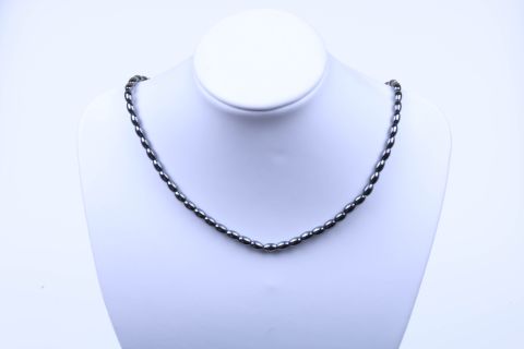 Kette Hematite, schwarz, Reiskorn, 4x6mm, Karabiner goldfarben, 40cm m.Verlängerung