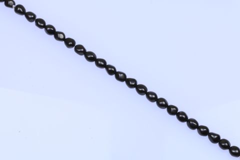 Strang Muschelkern, grün schwarz, oval eckig, 8x12mm, 39cm