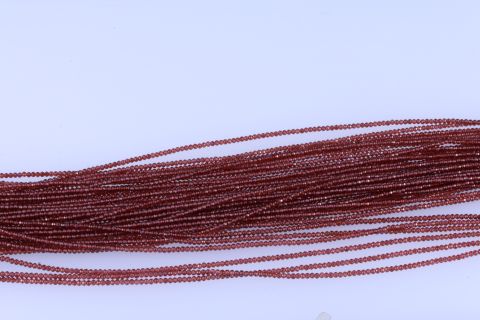 Strang Granat, rot braun, facettiert, 2mm, 40cm